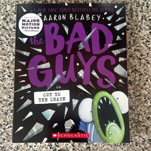 Scholastic The Bad Guys Book with Purple and Green Cover